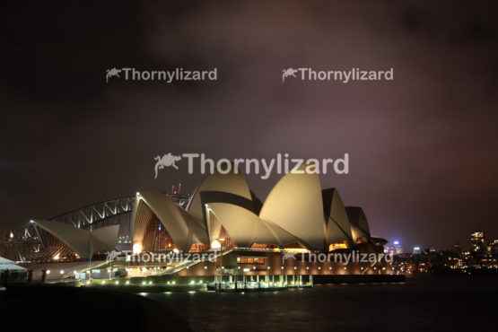 Sydney Harbour Bridge and opera house at night - Editorial Use Only